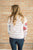 Model showing back view of floral sweatshirt.