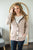 Model showing pocket detail on hooded sweater cardigan.